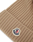 Cappello unisex Moncler Enfant con pom pon - Ninna Nanna