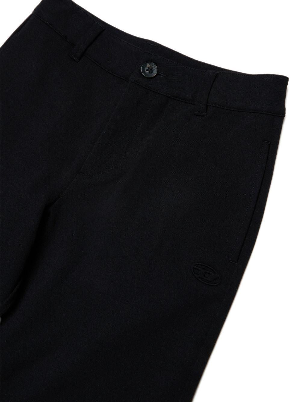 Pantaloni per bambina Diesel Kids a zampa - Ninna Nanna